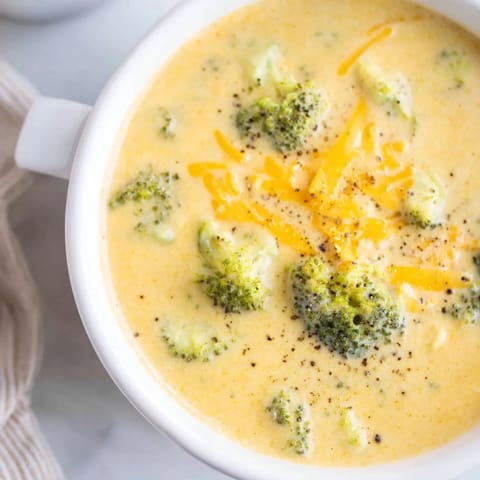 Creamy, vibrant Broccoli Cheese Soup, a homemade American classic, ready and garnished.